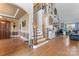 Expansive foyer with hardwood floors, staircase, decorative accents, and an inviting atmosphere at 4858 Sagittarius Cir, Denver, NC 28037