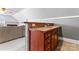 Bonus room wet bar with wood cabinetry, tile backsplash, and stainless steel sink at 4858 Sagittarius Cir, Denver, NC 28037