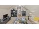 Spacious bonus room featuring a comfortable seating area, entertainment center, and stylish decor at 5114 Morrowick Rd, Charlotte, NC 28226