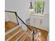 Elegant two-story foyer features hardwood floors, grand staircase, and a bright, open atmosphere at 5114 Morrowick Rd, Charlotte, NC 28226