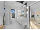 Bright bathroom featuring a double sink vanity, modern fixtures, and a large window at 680 Ideal Way, Charlotte, NC 28203