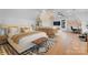 Bright and airy bedroom with hardwood floors, a king bed and designated areas at 680 Ideal Way, Charlotte, NC 28203