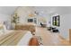 Spacious bedroom featuring a defined sitting area, desk and workout space at 680 Ideal Way, Charlotte, NC 28203