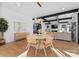 Open floor plan featuring a dining area, hardwood floors and views into the Gathering room at 680 Ideal Way, Charlotte, NC 28203