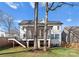Beautiful two-story home with a screened in porch and a well-maintained lawn at 680 Ideal Way, Charlotte, NC 28203