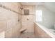 Bathroom showcasing a tiled walk-in shower with built in bench seating and a large shower head at 7343 Rock Island Rd, Charlotte, NC 28278