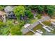 Aerial view of property with lake access, boat dock, and manicured landscaping at 8014 Kiwi Pt, Tega Cay, SC 29708