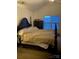Bedroom featuring a large bed with decorative dark wood headboard under a vaulted ceiling at 806 Dale Ave, Charlotte, NC 28216