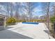 Fenced backyard with an in-ground pool and large concrete deck at 809 E 23Rd Street St, Newton, NC 28658