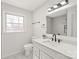 Bright bathroom features modern fixtures, quartz countertops, and natural light at 809 E 23Rd Street St, Newton, NC 28658