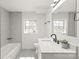Updated bathroom featuring modern vanity, fixtures, and natural lighting at 809 E 23Rd Street St, Newton, NC 28658