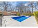 Relaxing in-ground pool with concrete patio and access to the screened in porch at 809 E 23Rd Street St, Newton, NC 28658