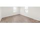 Room features wood floors, neutral colors, and bright natural light at 809 E 23Rd Street St, Newton, NC 28658
