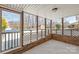 Covered screened porch with brick and lattice details, providing a relaxing outdoor space at 809 E 23Rd Street St, Newton, NC 28658