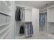 Organized walk-in closet with custom shelving and ample storage space for clothes and accessories at 8201 Tonawanda Dr, Charlotte, NC 28277