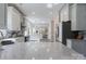 Bright kitchen with an open concept featuring stainless steel appliances and stone countertops at 8201 Tonawanda Dr, Charlotte, NC 28277