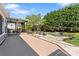 Expansive backyard featuring a large deck, covered porch, inground pool, and lush landscaping at 8511 Fox Tail Ln, Huntersville, NC 28078