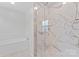Sleek bathroom featuring a glass enclosed shower and separate soaking tub at 8511 Fox Tail Ln, Huntersville, NC 28078