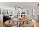 Open-concept living area, hardwood floors, and large windows flooding the space with natural light at 914 Greenleaf Ave # A, Charlotte, NC 28202
