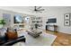 Modern living room with oversized windows, hardwood floors, and contemporary décor at 914 Greenleaf Ave # A, Charlotte, NC 28202