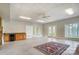 Spacious finished basement features tile flooring, a wet bar, and natural light from the door to outside at 928 Thorn Ridge Ln, Clover, SC 29710