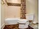 Cozy bathroom features a tiled shower-tub combo and tiled floors at 928 Thorn Ridge Ln, Clover, SC 29710