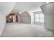 Spacious carpeted bedroom features vaulted ceilings, large windows, and an ensuite at 928 Thorn Ridge Ln, Clover, SC 29710