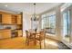 Charming breakfast nook with wooden table, built-in cabinets, and natural light at 928 Thorn Ridge Ln, Clover, SC 29710