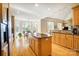 Bright kitchen with a large island, stainless steel appliances, and a breakfast nook with views at 928 Thorn Ridge Ln, Clover, SC 29710
