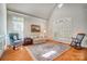 Inviting living room with hardwood floors, large windows, and comfortable seating at 928 Thorn Ridge Ln, Clover, SC 29710