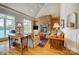 Cozy living room with stone fireplace, built-in shelving, and hardwood floors at 928 Thorn Ridge Ln, Clover, SC 29710