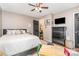 Bedroom with neutral walls, black furnishings and trim, and small table with chairs at 9401 Elvis Dr, Charlotte, NC 28215