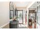 Inviting entryway featuring elegant decor, natural light, and a view into other rooms at 9401 Elvis Dr, Charlotte, NC 28215