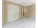 Bedroom features a closet, a doorway to a hallway, and carpet flooring at 9423 Fairmead Dr, Charlotte, NC 28269