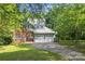 Charming two-story home with a well-manicured lawn and a two-car garage at 9423 Fairmead Dr, Charlotte, NC 28269