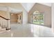 Bright, spacious living room with light-colored floors and a large window at 9423 Fairmead Dr, Charlotte, NC 28269