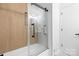 Contemporary bathroom featuring tiled shower with glass door and neutral color palette for a relaxing spa-like feel at 9930 Sardis Oaks Rd, Charlotte, NC 28270