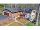 A high angle view shows the home's spacious backyard with a patio and well-maintained lawn at 101 Woodvale Cir, Lincolnton, NC 28092