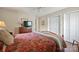 Comfortable bedroom features a ceiling fan and a spacious closet for ample storage at 101 Woodvale Cir, Lincolnton, NC 28092