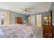 Comfortable bedroom with a window and a ceiling fan at 101 Woodvale Cir, Lincolnton, NC 28092