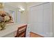 Charming vanity area with decorative mirror, chair, and closet space at 101 Woodvale Cir, Lincolnton, NC 28092