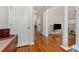 Foyer leading into the living area with hardwood floors at 10802 Tradition View Dr, Charlotte, NC 28269