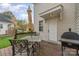 Inviting outdoor deck with seating area and grill, perfect for outdoor dining and entertaining at 10802 Tradition View Dr, Charlotte, NC 28269