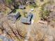 Aerial view showcases the home's roof and large lot, surrounded by mature trees and neighboring properties at 11018 Despa Dr, Mint Hill, NC 28227