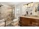 Bathroom featuring a glass shower, vanity with granite countertop, and updated fixtures at 11018 Despa Dr, Mint Hill, NC 28227
