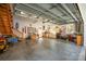 Spacious garage with a workshop area, stairs to a loft, and lots of natural light at 11018 Despa Dr, Mint Hill, NC 28227