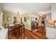 Inviting kitchen and dining area featuring hardwood floors and stainless steel appliances at 11018 Despa Dr, Mint Hill, NC 28227