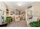 Cozy seating area with a view into the modern kitchen beyond, perfect for relaxed living and casual gatherings at 11018 Despa Dr, Mint Hill, NC 28227