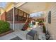 Relaxing covered patio with outdoor seating, perfect for entertaining at 11018 Despa Dr, Mint Hill, NC 28227