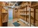 Partially finished basement with carpeting and an unfinished area for customization at 123 Lucy Ln, Statesville, NC 28625